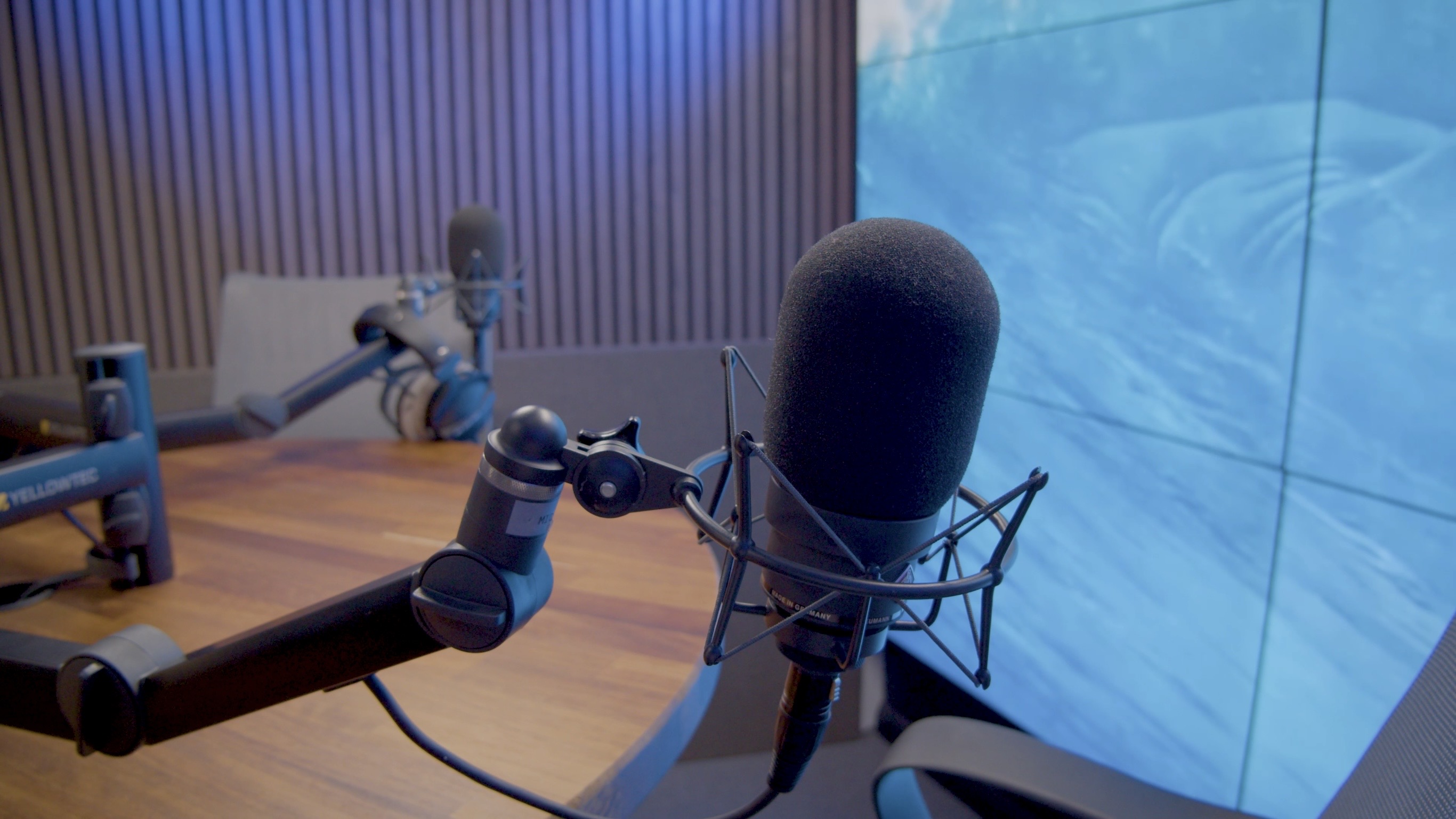 Close-up of professional Neumann microphone at Brazen Studios voiceover studio London: industry-standard audio equipment for podcast, voiceover, and content creation studio productions.